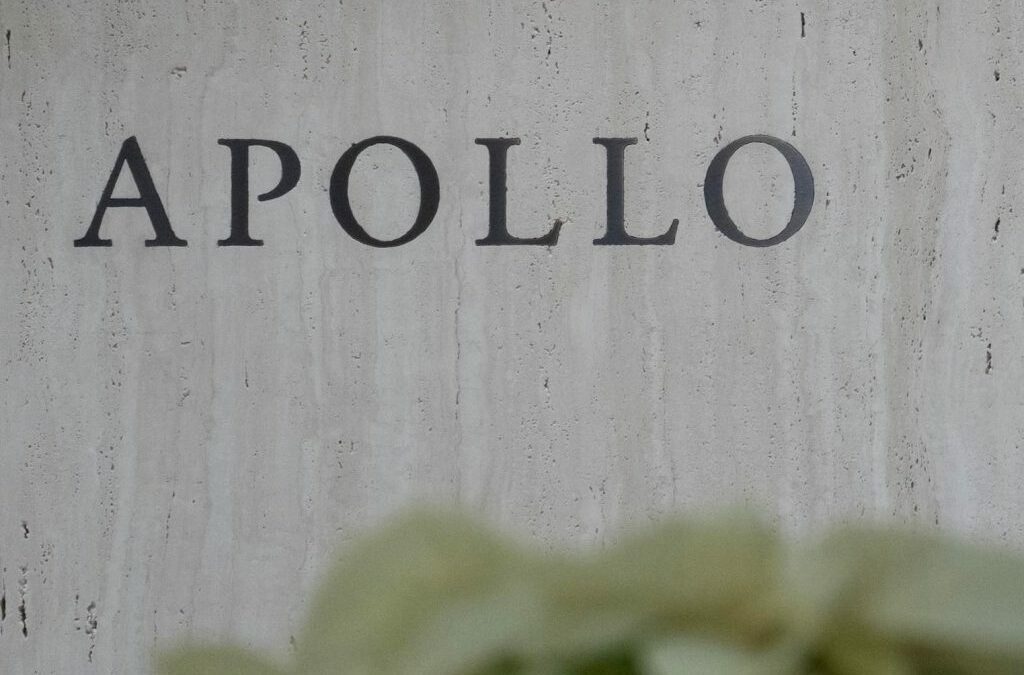 Apollo Global Management signage in New York, US, on Tuesday, Dec. 5, 2023. Apollo's CEO said it's getting harder for active managers to beat indexes in public markets and that it is easier for investors to find alpha in private markets. Photographer: Jeenah Moon/Bloomberg via Getty Images