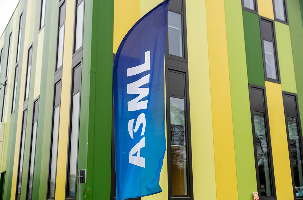A banner flag with the ASML logo outside the Brainport Industries Campus, which houses the ASML Academy, in Eindhoven, Netherlands.