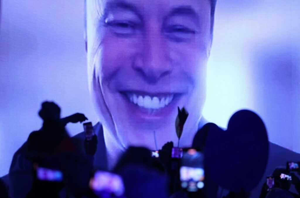 Tech billionaire Elon Musk speaks live via a video transmission during the election campaign launch rally of the far-right Alternative for Germany (AfD) political party on January 25, 2025 in Halle, Germany