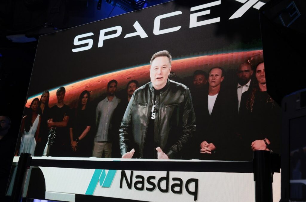 Elon Musk, founder and CEO of SpaceX, speaks via video before the ringing of opening bell at the Nasdaq Marketsite at the launch of the company's initial public offering (IPO) on June 12, 2026