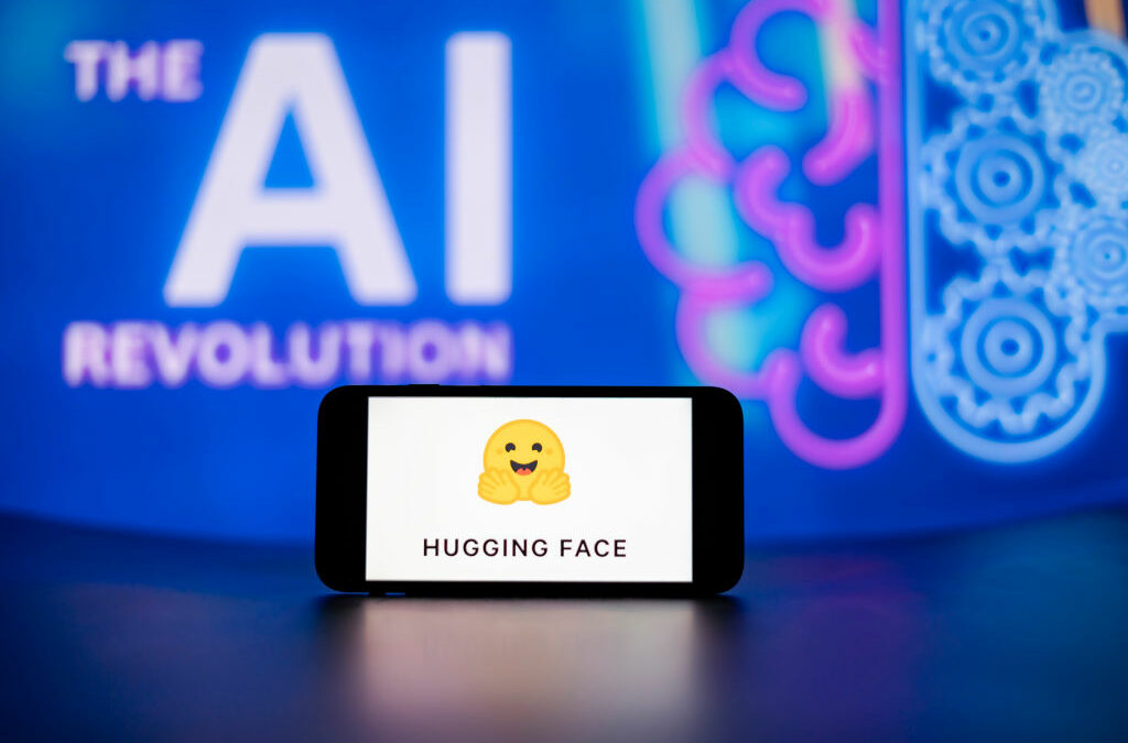 In this photo illustration, the Hugging Face logo seen displayed on a mobile phone screen with the AI (artificial intelligence) revolution symbol in the background.