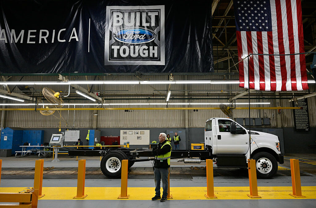 A completed commercial truck rolls off the assembly line at Ford's Ohio Assembly Plant in Sheffield Lake, Ohio.