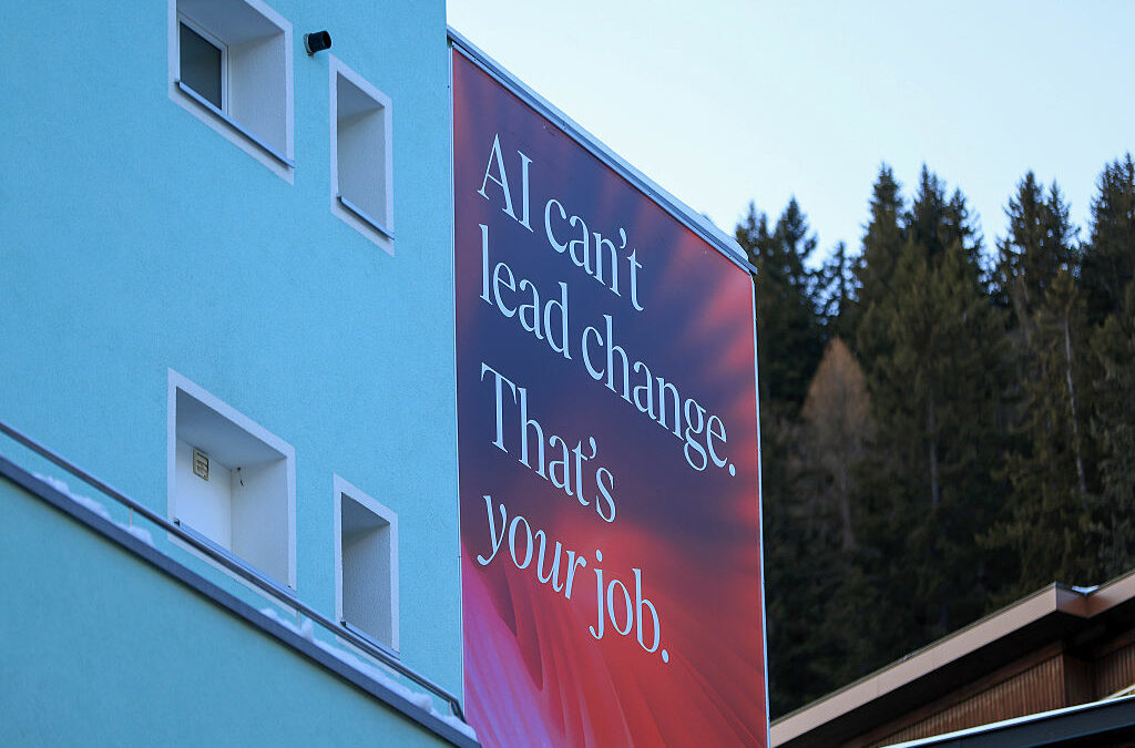 A slogan reading "AI Can't Lead Change. That's Your Job" on a pavilion ahead of the World Economic Forum(WEF) annual meeting in Davos, Switzerland, on Sunday, Jan 18, 2026.