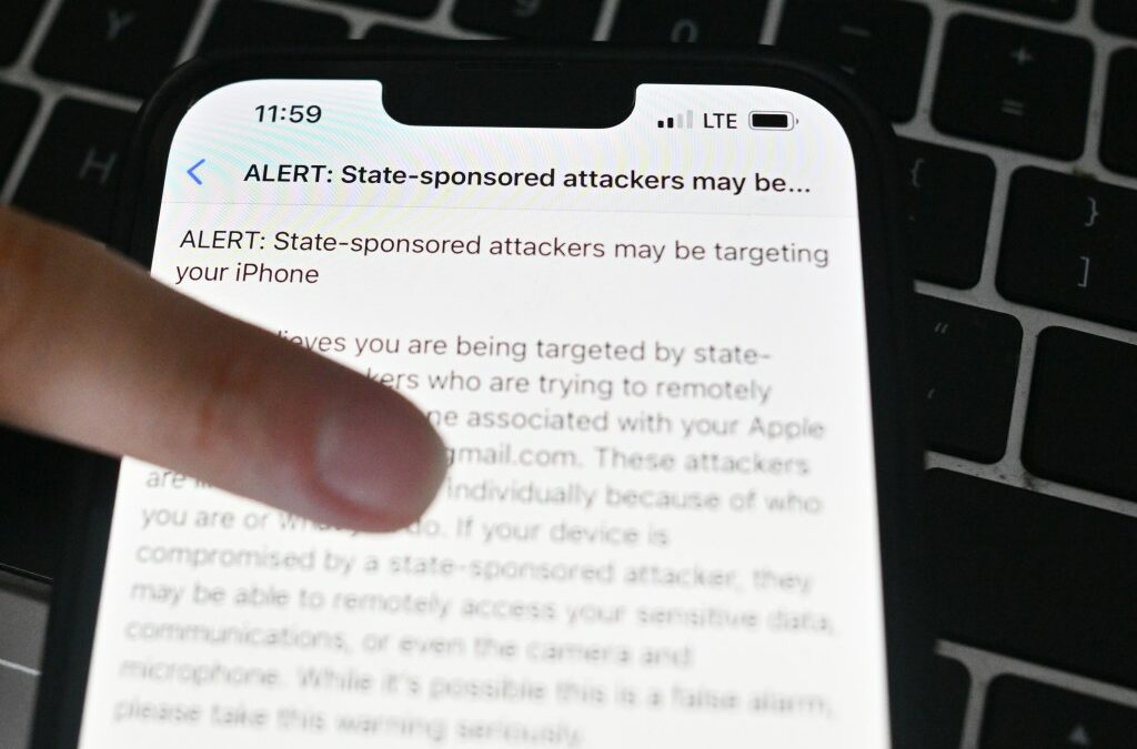 A Polish journalist iPhone displays an Apple alert saying "state sponsored attackers may be targeting your iPhone" on March 07, 2024 in Warsaw, Poland.