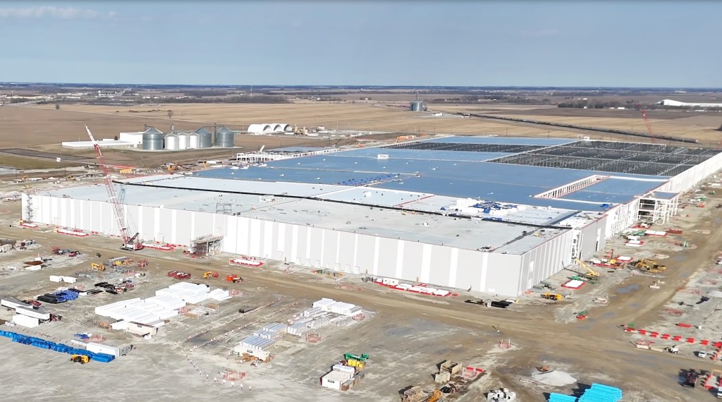 An aerial view of a battery factory under construction.