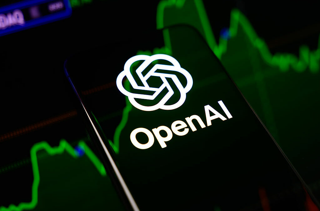The OpenAI logo is displayed on a smartphone screen