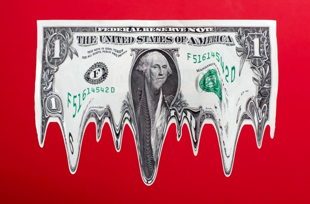US $1 dollar bill in mid-air, melting
