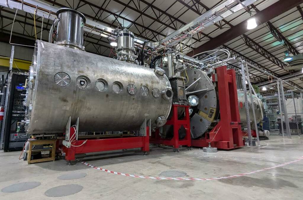 Realta Fusion's device sits in a large warehouse-like building.