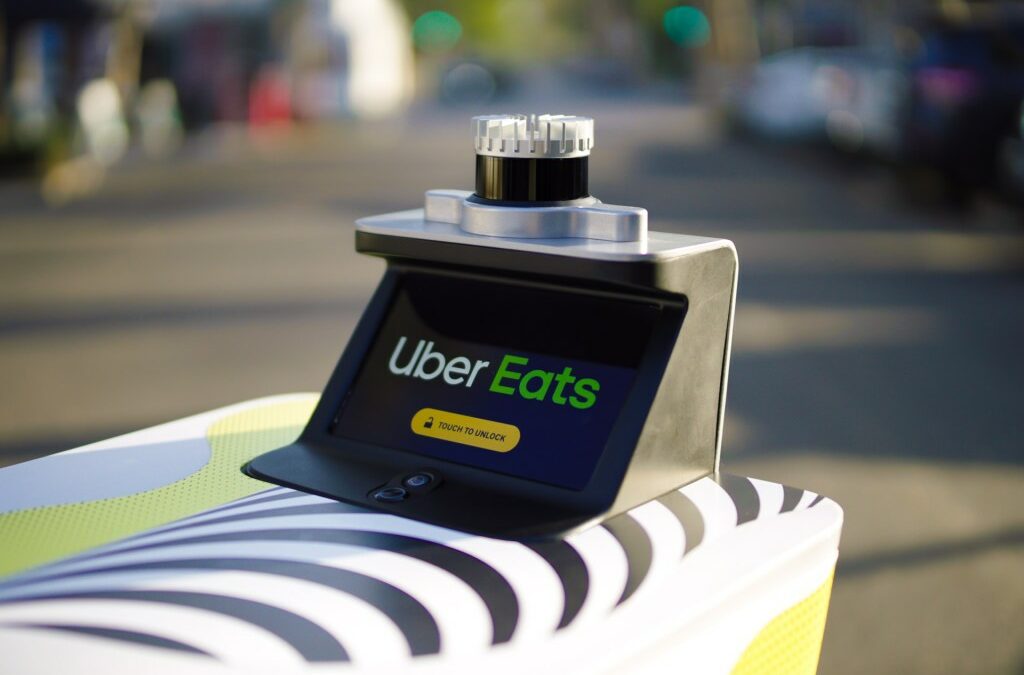 serve robot with uber eats branding
