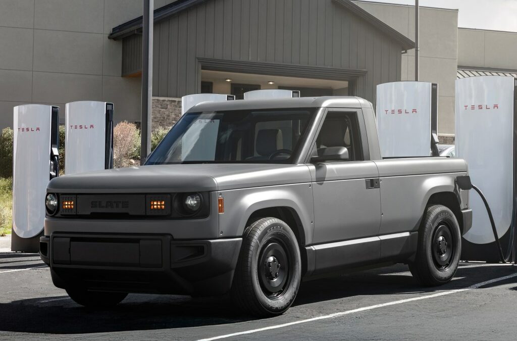Slate Auto's Blank Slate truck charging at a Tesla Supercharger