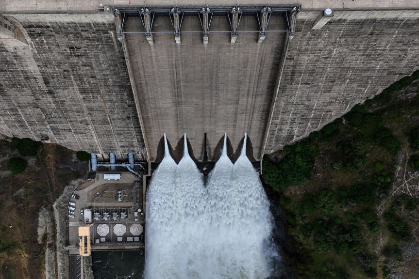 Pine Flat, CA, Tuesday, May 2, 2023 - Water rushes out of Pine Flat Dam as the Army Corps of Engineers continue to manage flows into the King's River weeks before the record Sierra snowpack melts. (Robert Gauthier/Los Angeles Times via Getty Images)