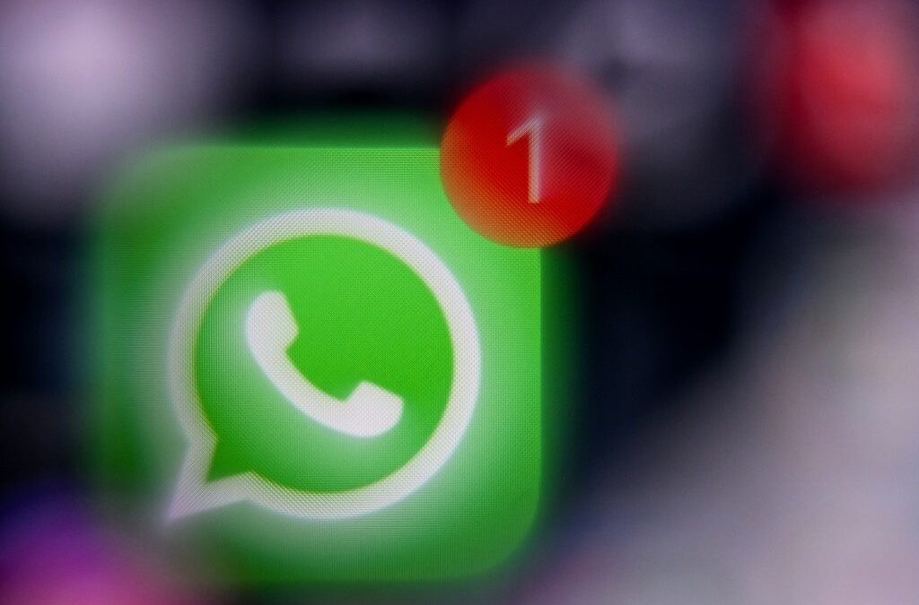 This illustration photograph taken on December 1, 2025, shows the logo of US instant messaging software Whatsapp displayed on a smartphone's screen.
