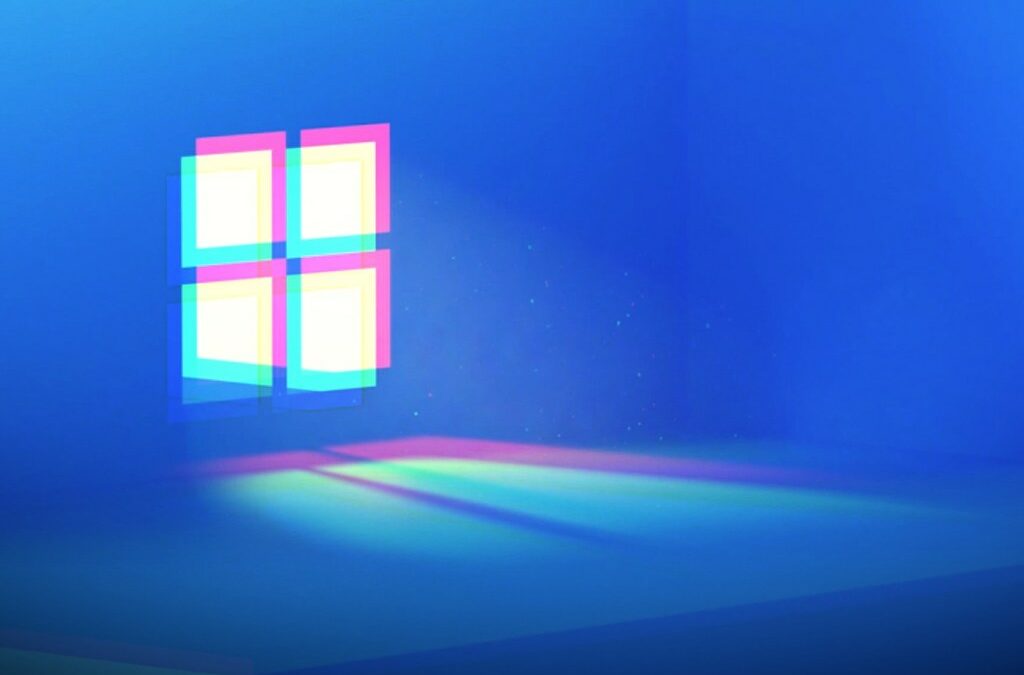 Windows logo blurred on a blue background.