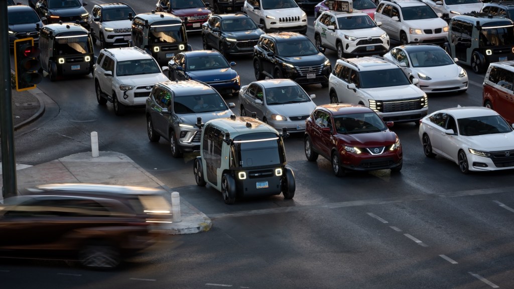 Zoox robotaxi in Vegas traffic